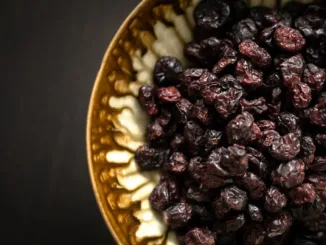 black berries on yellow ceramic plate