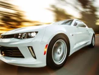 Close-Up Photography of White Chevrolet Camaro